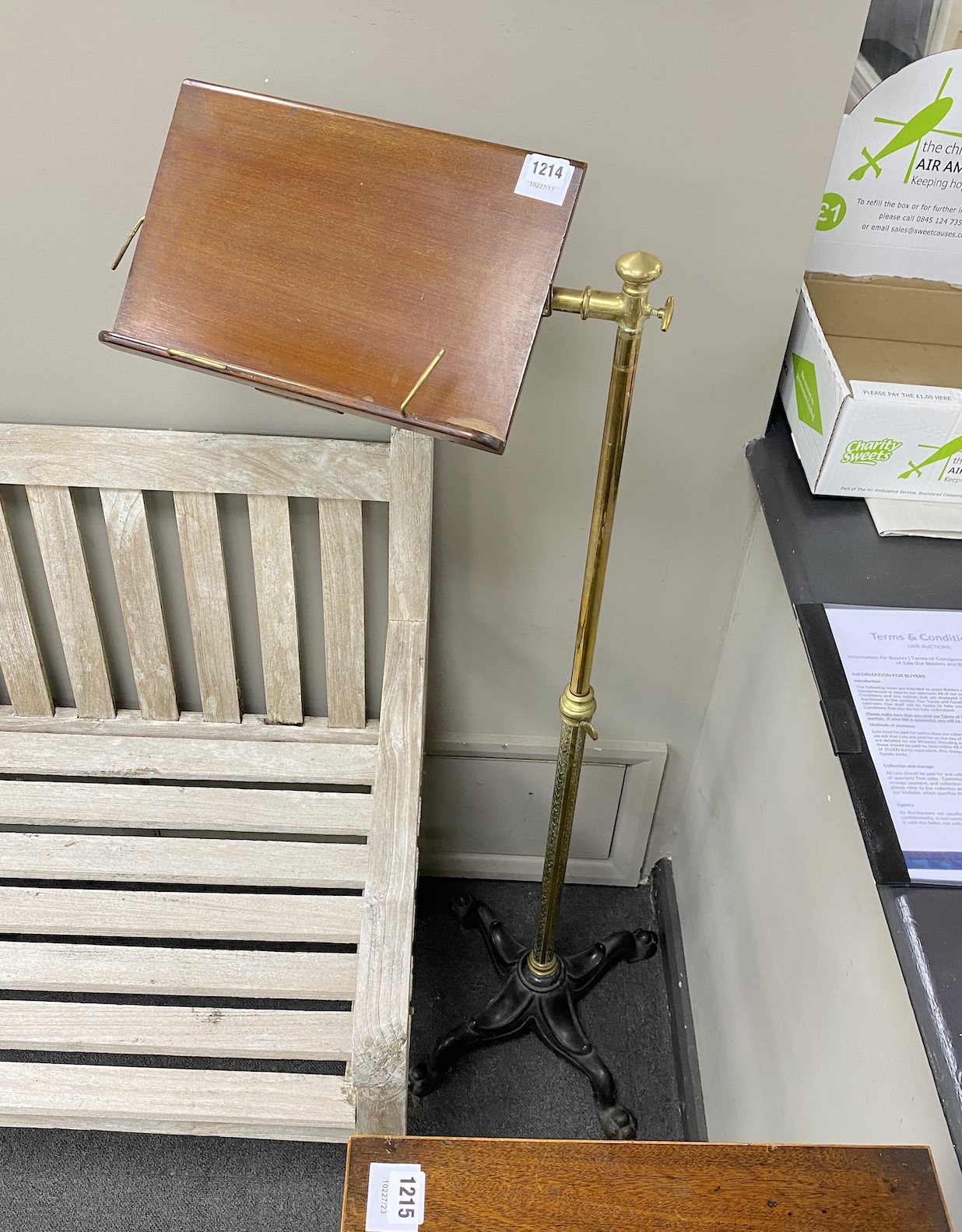 A late Victorian adjustable brass and cast iron music stand